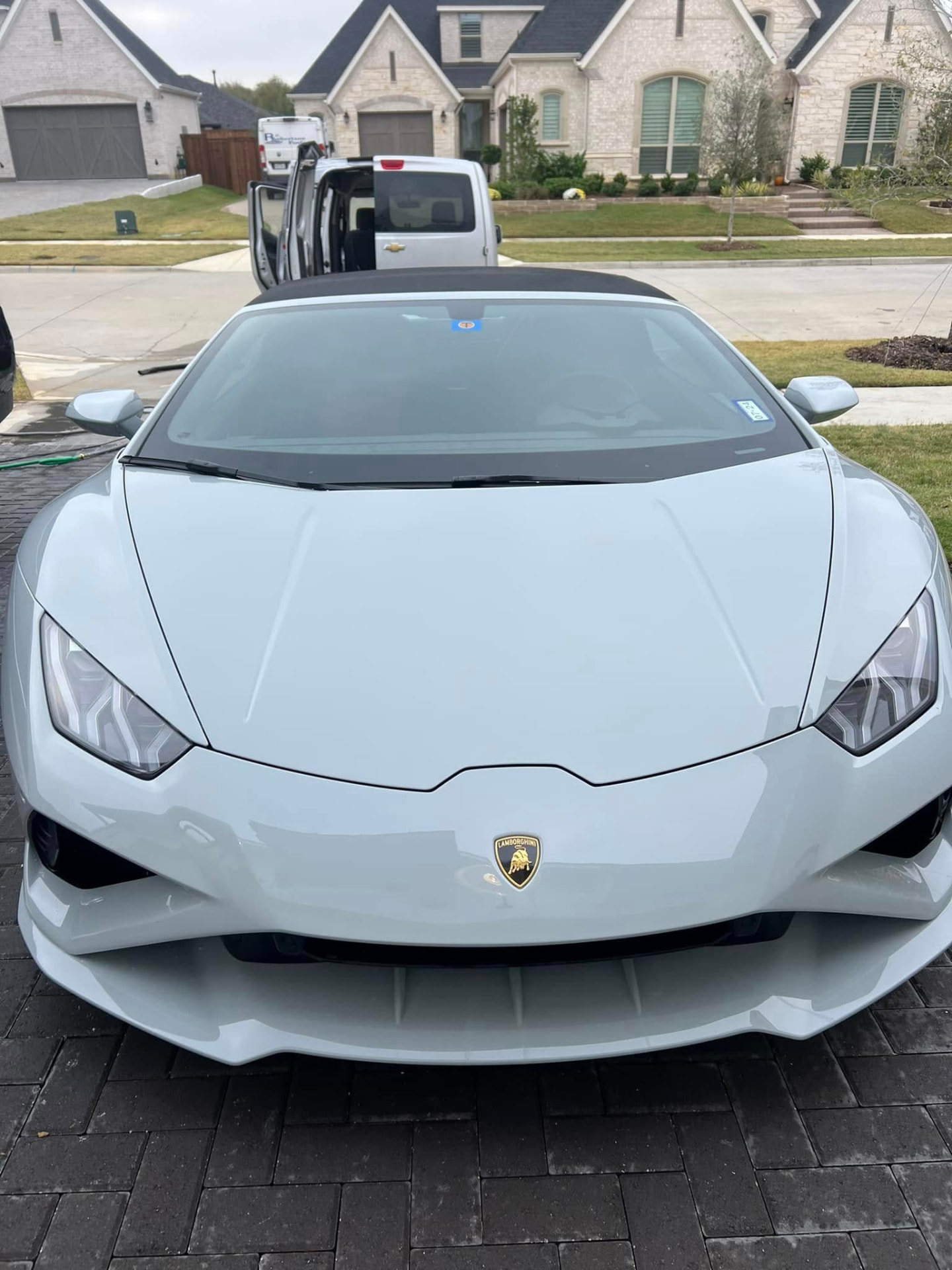 Lamborghini Huracan detailed in a residential driveway